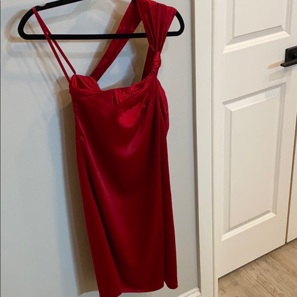 Red silk knee length shoulder strap dress
